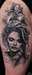 upperleg-area-tattoo-tattoofrequency-woman-portrait-ship-octopus-sexy-compass-girl-marispavlo-cut