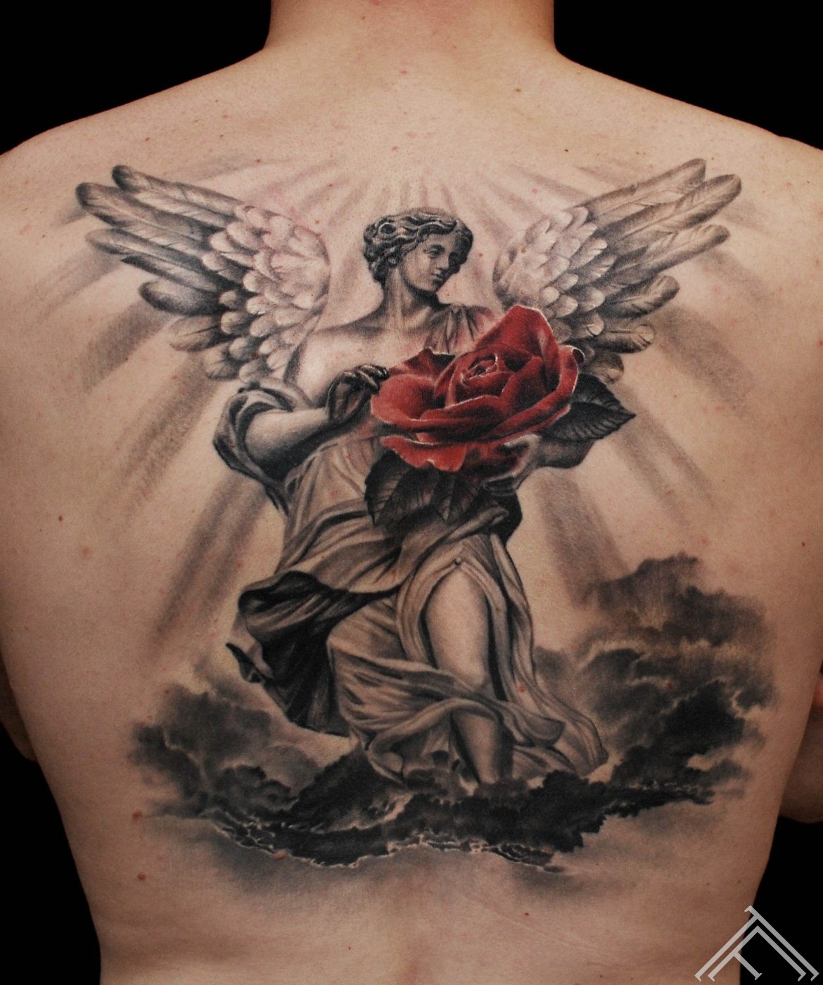 Angel_rose_clouds_stars_back_tattoo_tattoofrequency_marispavlo_mlapa